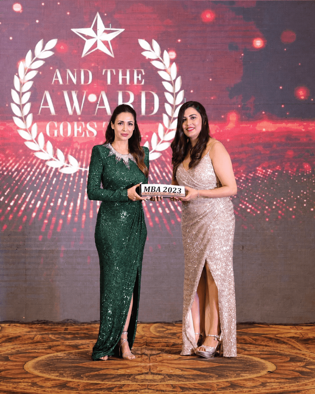 Dr. Sneha Jain receiving an award
