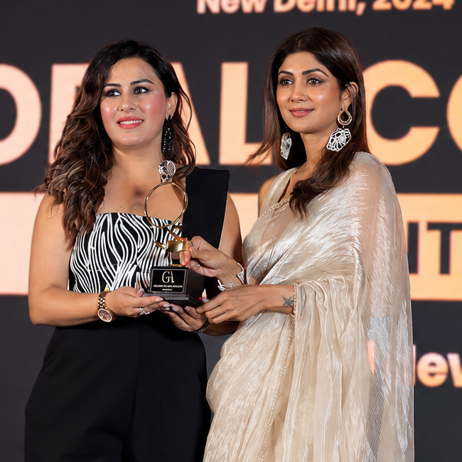 Dr. Sneha Jain receiving an award