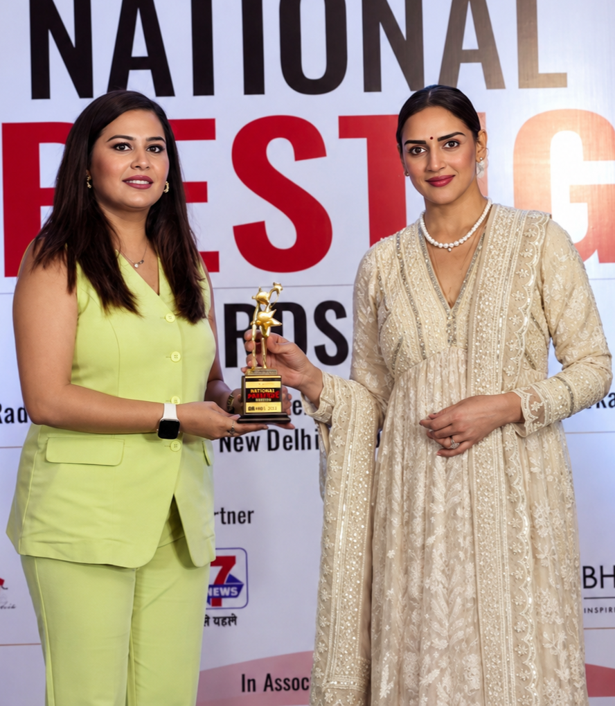 Dr. Sneha Jain receiving an award