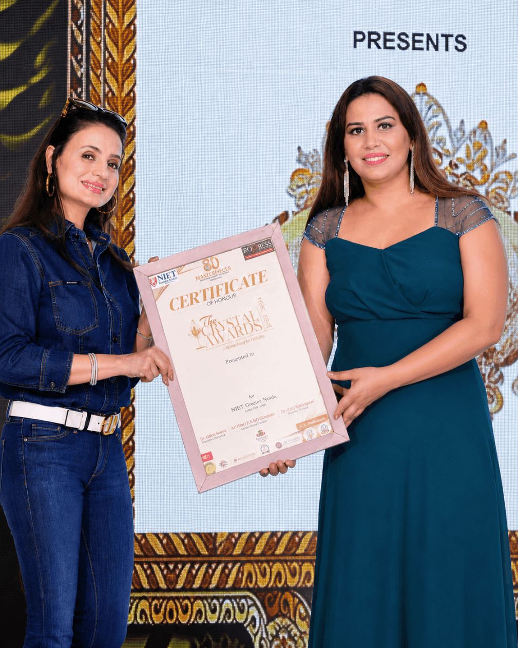 Dr. Sneha Jain receiving an award